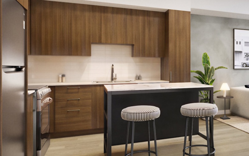 a kitchen with wood cabinets